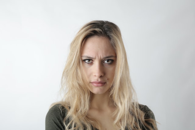 portrait-photo-of-woman-frowning-3785839(1).jpg