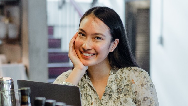 joyful-young-asian-female-relaxing-in-bar-4350180 (1).jpg