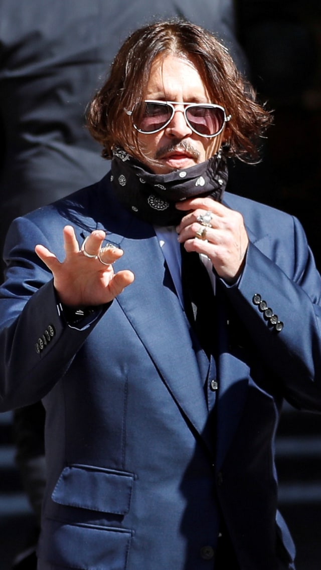 Aktor Johnny Depp tiba di Pengadilan Tinggi di London, Inggris, Selasa (7/7). Foto: Peter Nicholls/REUTERS