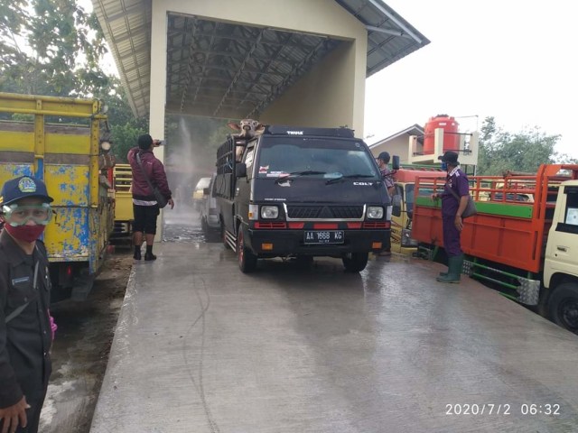 Kolam disinfektan yang disiapkan Disperindag Gunungkidul. FOto: Istimewa.