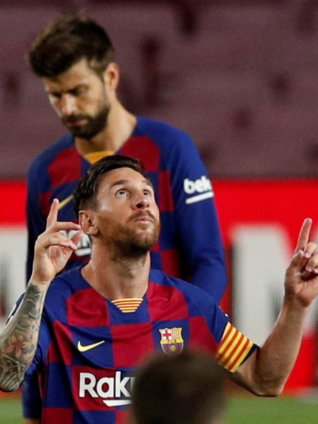Pemain Barcelona Lionel Messi berselebrasi usai mencetak gol pada pertandingan La Liga Santander FC Barcelona vs Osasuna di Stadion Camp Nou, Barcelona, Spanyol. Foto: Albert Gea REUTERS