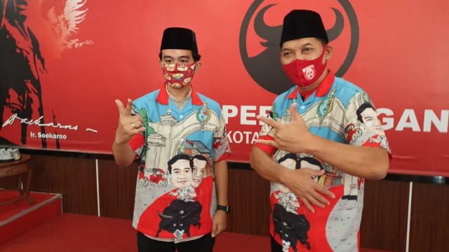 Gibran-Teguh Pamer Baju Kampanye Pilwalkot Solo: Bergambar Naik Banteng (751654)