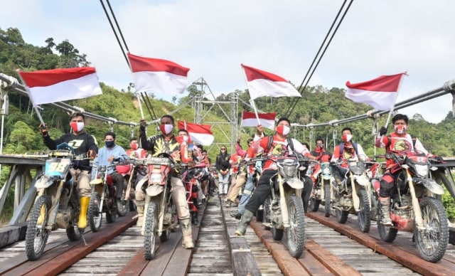 Rombongan kendaraan  Adventure Merah Putih Trans Papua akhirnya tiba di Distrik Airu, Kabupaten Jayapura.  (Dok Polda Papua)
