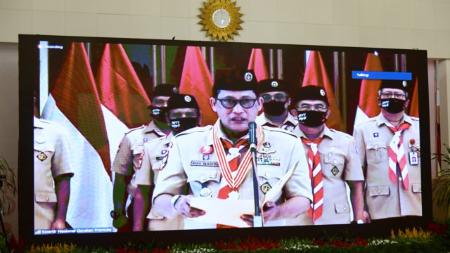 Dirut Bulog Budi Waseso saat berpidato di Peringatan Hari Pramuka ke-59 secara virtual, yang ditamilkan dari layar di Istana Kepresidenan, Jakarta, Rabu (12/8). Foto: Biro Pers Sekretariat Presiden