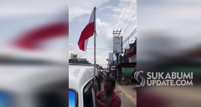 Tangkapan layar video sopir angkot salah pasang bendera saat dihentikan warga di Cibadak Sukabumi | Sumber Foto:ISTIMEWA