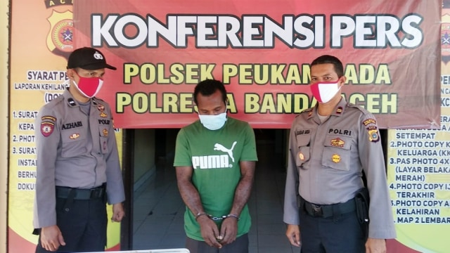 Pelaku pencurian enam AC di rumah dinas Pengadilan Tinggi Aceh di Ajuen, Peukan Bada, Aceh Besar. Foto: Polresta Banda Aceh