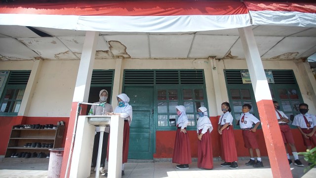 Foto: Aktivitas Siswa SD di Sumsel setelah Diizinkan Kembali Sekolah (128241)