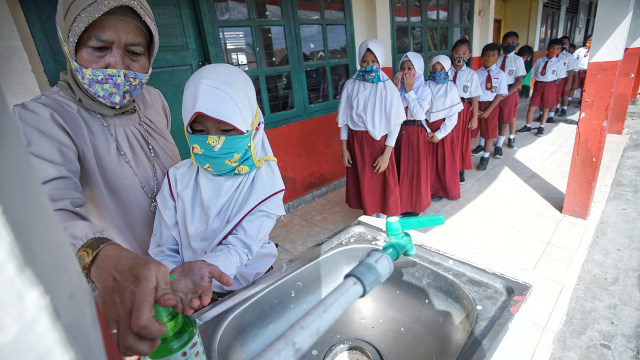 Foto: Aktivitas Siswa SD di Sumsel setelah Diizinkan Kembali Sekolah (128244)