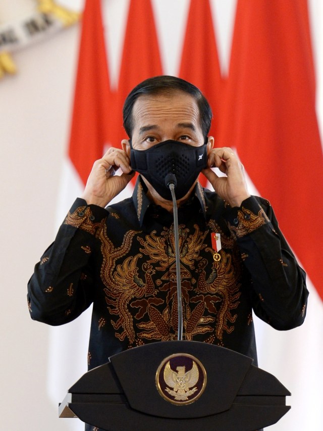 Presiden Joko Widodo mengenakan masker di Acara Aksi Nasional Pencegahan Korupsi. Foto: Laily Rachev/Biro Pers Sekretariat Presiden