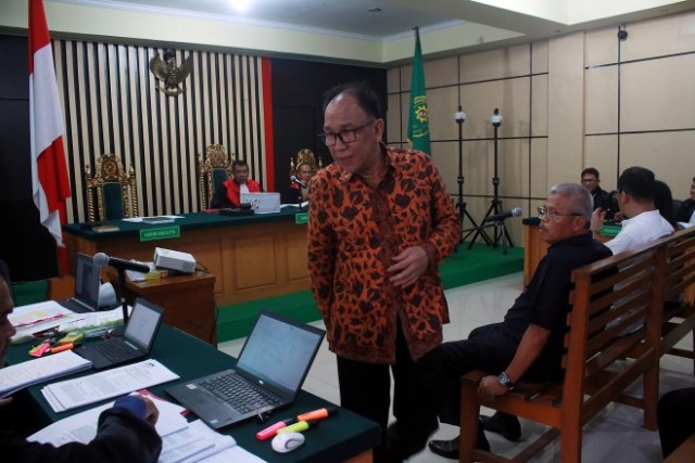 Asiang saat menjalani persidangan kasus suap ketok palu di Pengadilan Tipikor Jambi. Foto: Istimewa 