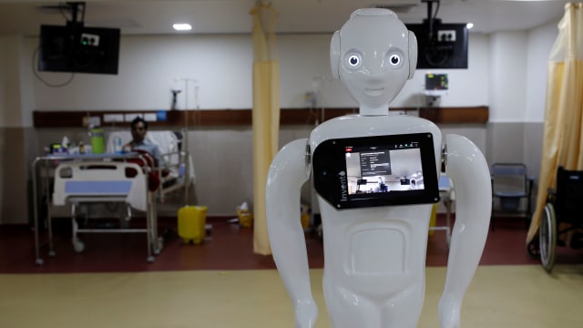 Foto: RS di India Gunakan Robot untuk Bantu Pasien Komunikasi dengan Kerabat (201914)