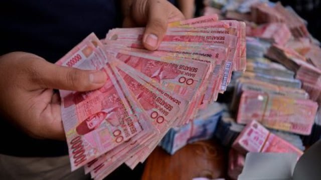 Ilustrasi penggandaan uang (Foto: Kumparan)