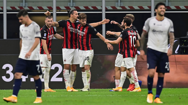 Selebrasi pemain AC Milan usai mencetak gol ke gawang Bologna pada pertandingan lanjutan Serie A Italia di stadion San Siro, Milan, Italia. Foto: MIGUEL MEDINA / AFP