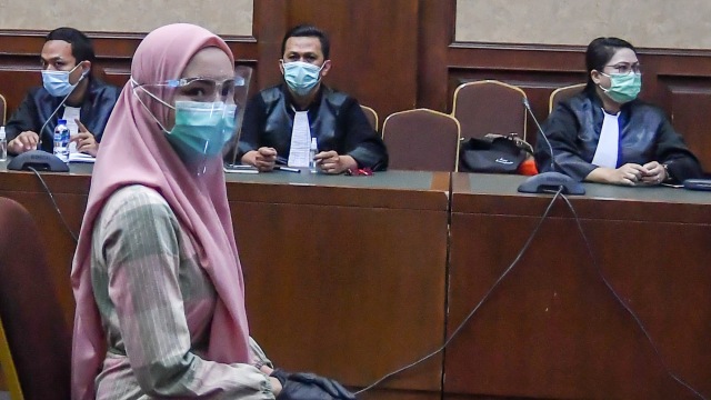 Terdakwa Pinangki Sirna Malasari saat mengikuti sidang perdana di Pengadilan Negeri Jakarta Pusat, Rabu (23/9). Foto: Muhammad Adimaja/ANTARA FOTO