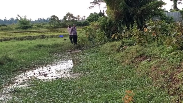 Parit Kampung Kalisemen, Distrik Nabire, Kabupaten Nabire, lokasi ditemukan jasad pria (Dok Polda Papua).