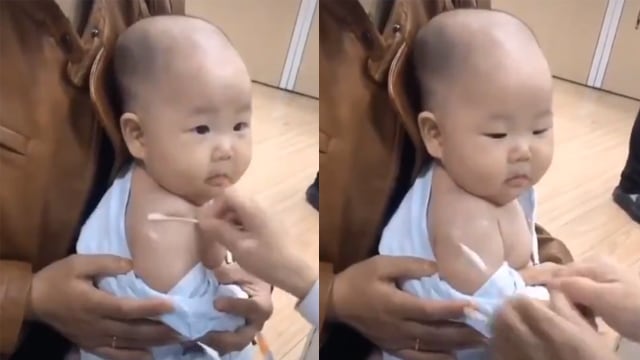 Bayi polos disuntik imunisasi. (Foto: @repvblikvideo/Twitter)
