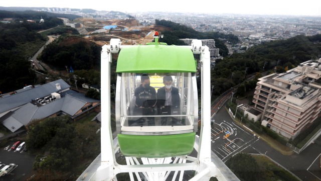 Foto: Bekerja Jarak Jauh di Taman Hiburan di Tokyo, Jepang (88655)