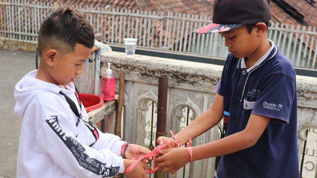 ﻿Game mengasah otak santri TPQ Masjid Miftahul Huda Desa. Petung Sewu, Kecamatan. Dau, Kabupaten. Malang