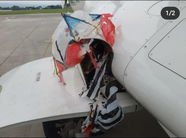 Layang-layang yang tersangkut di pesawat yang akan mendarat di Bandara Internasional Adisutjipto Yogyakarta. FOto: Istimewa.