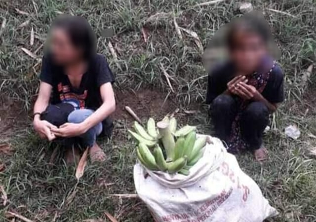 Dua bocah remaja di Brebes diamankan polisi karena diduga mencuri pisang di sebuah kebun milik warga, Senin 26 Oktober 2020. (Foto: Istimewa/Facebook)