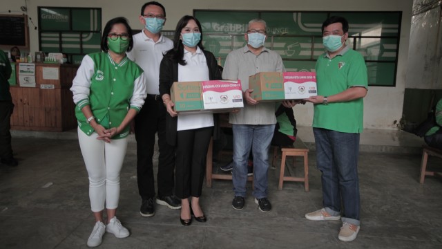 Grab dan Jangkau.id Sumbang 30.000 Masker Gratis untuk Mitra Driver (667433)