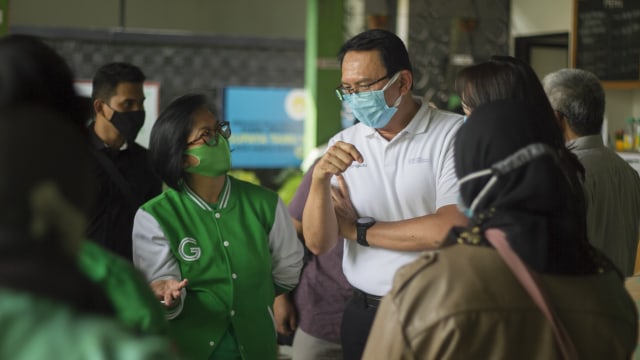 Grab dan Jangkau.id Sumbang 30.000 Masker Gratis untuk Mitra Driver (667432)