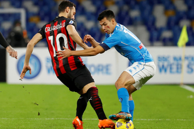 Pertandingan Napoli vs AC Milan di Stadion San Paolo, Napoli, Italia, Minggu (22/11). Foto: Ciro De Luca/REUTERS 