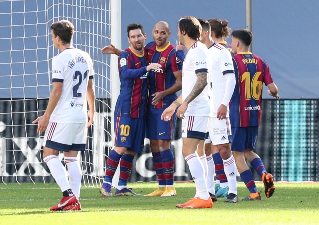 Selebrasi pemain FC Barcelona saat melawan Osasuna di Camp Nou, Barcelona, Spanyol. Foto: Albert Gea/Reuters