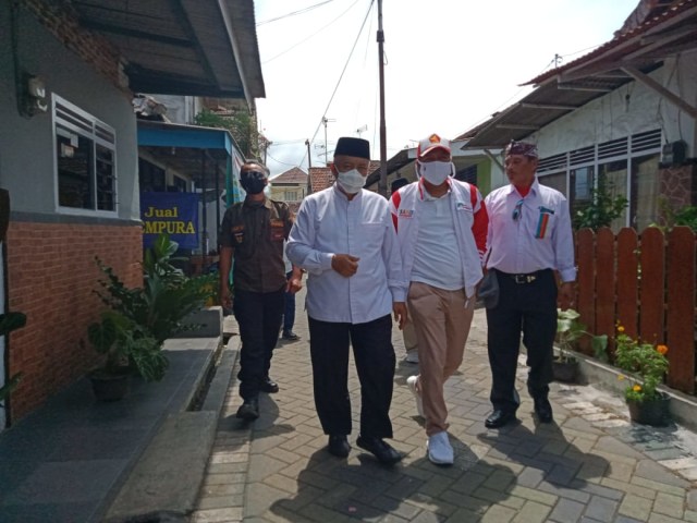 Sanusi dan Tim Pemenangan Sandi saat berkampanye di Kecamatan Lawang. Foto: Rizal Adhi