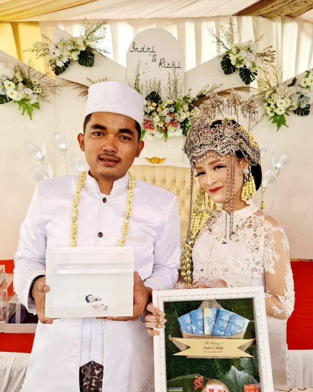 Viral pernikahan dengan maskawin sepasang ikan cupang di Bekasi. Foto: Dok. Rizki Muhammad 