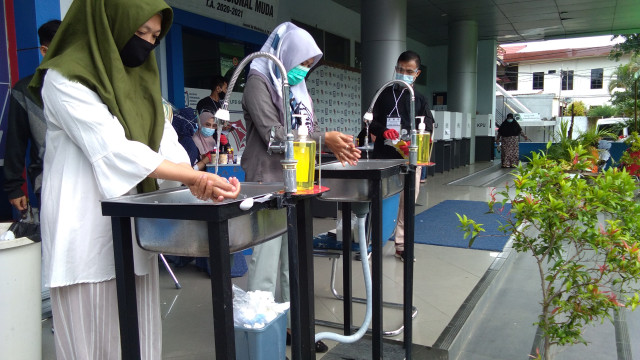 Dokumen pribadi/Prosesi mencuci tangan sebelum melakukan pencoblosan di salah satu TPS Kota Makassar