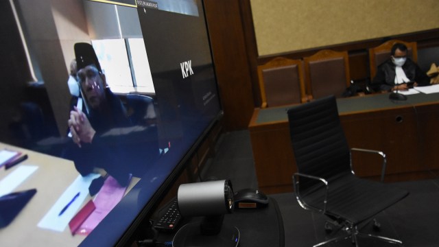 Terdakwa mantan anggota BPK Rizal Djalil menjalani sidang perdana secara virtual dengan agenda pembacaan dakwaan di Pengadilan Tipikor, Jakarta, Senin (28/12). Foto: Indrianto Eko Suwarso/ANTARA FOTO