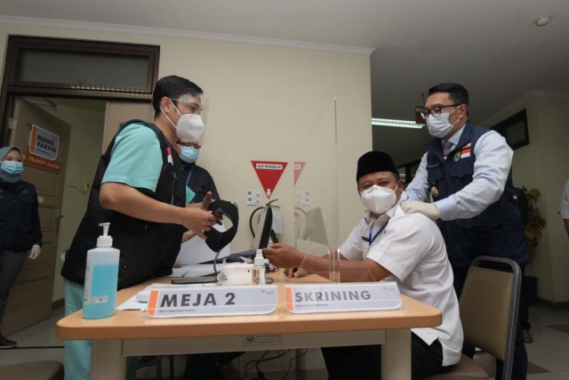 Terobosan di Tahun Vaksinasi COVID-19 (52555)