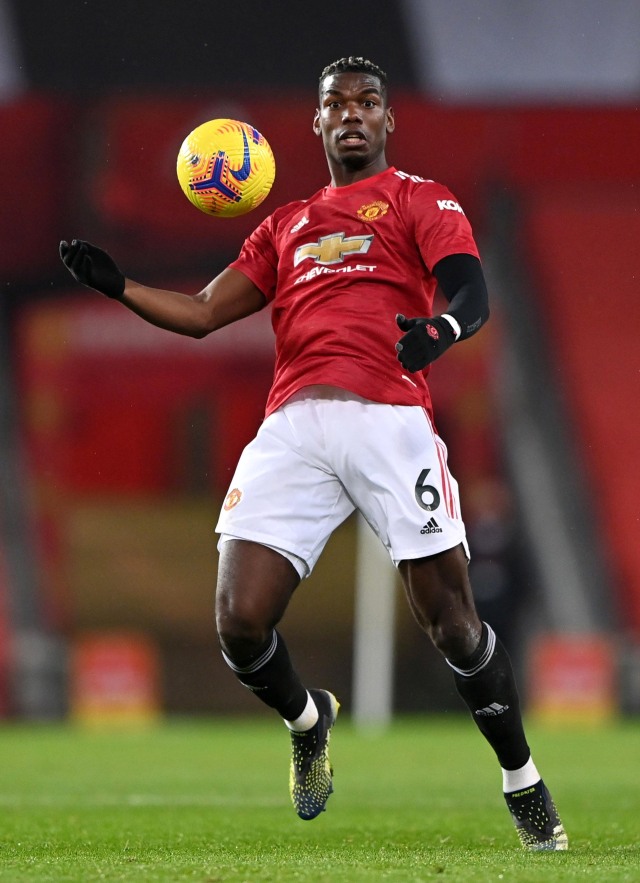 Pemain Manchester United, Paul Pogba saat melawan Sheffield United di Old Trafford, Manchester, Inggris. Foto: Laurence Griffiths/Reuters