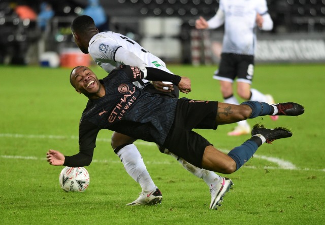 Pertandingan antara Swansea City vs Manchester City di Liberty Stadium, Swansea, Wales, Inggris. Foto: Rebecca Naden/Reuters