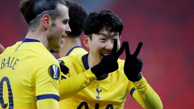 Son Heung-min dari Tottenham Hotspur berselebrasi usai mencetak gol ke gawang Wolfsberger AC di Puskas Arena, Budapest, Hongaria, Kamis (18/2). Foto: Bernadett Szabo/REUTERS