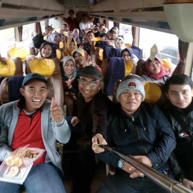 Para penumpang bus Damri trayek ke luar negeri. Foto: dok. Istimewa