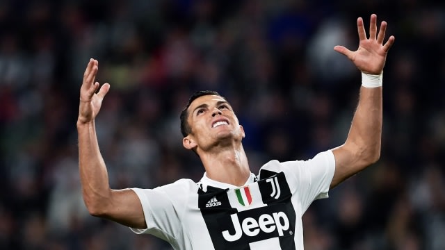 Ronaldo saat berlaga dengan Juventus. (Foto: AFP/Marco Bertorello)