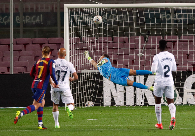 Pertandingan La Liga Santander antara FC Barcelona melawan SD Huesca di Camp Nou, Barcelona, Spanyol - 15 Maret 2021. Foto: Albert Gea/REUTERS