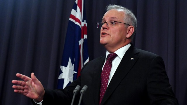 Perdana Menteri Australia Scott Morrison pada konferensi pers di Gedung Parlemen di Canberra, Selasa (23/3). Foto: AAP Image/Mick Tsikas