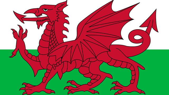 Bendera Wales dengan gambar naga merahnya. | Wikimedia Commons/Sangjinhwa (CC)