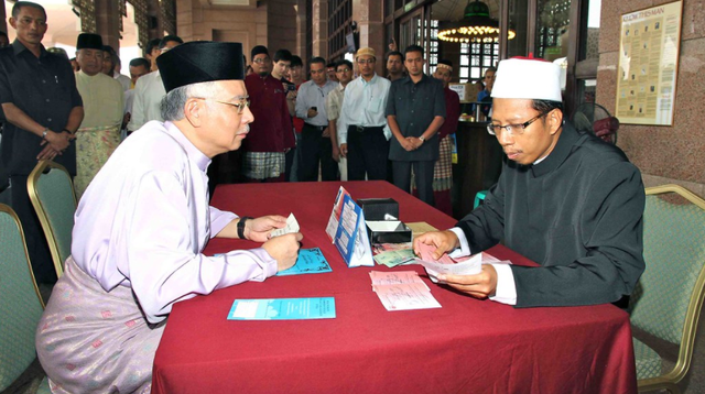 Doa niat mengeluarkan zakat fitrah. Sumber: flickr.com