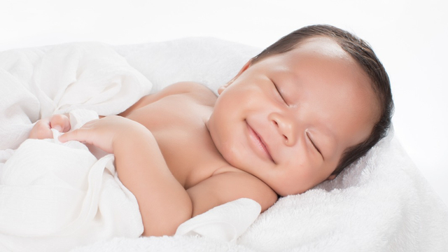 Fakta tentang senyuman bayi baru lahir Foto: Shutterstock