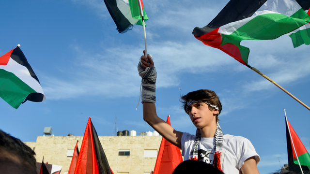 Aksi solidaritas warga Yordania membela rakyat Palestina. Foto: Muath Freij/REUTERS