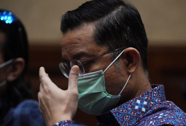 Terdakwa korupsi bansos Juliari Batubara bersiap mengikuti sidang lanjutan di Pengadilan Tipikor, Jakarta, Rabu (19/5/2021). Foto: Akbar Nugroho Gumay/ANTARA FOTO