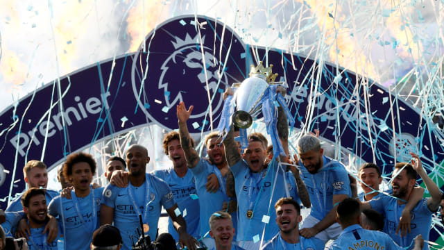 Para pemain Manchester City merayakan kemenangan menjadi juara Premier League. (Foto: REUTERS/Toby Melville)