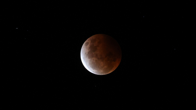 Ilustrasi gerhana bulan. Foto: Loren Elliott/REUTERS