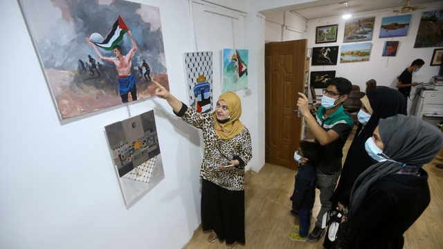 Seniman di Irak Beri Dukungan ke Palestina Lewat Lukisan. Foto:  REUTERS/Essam Al-Sudani