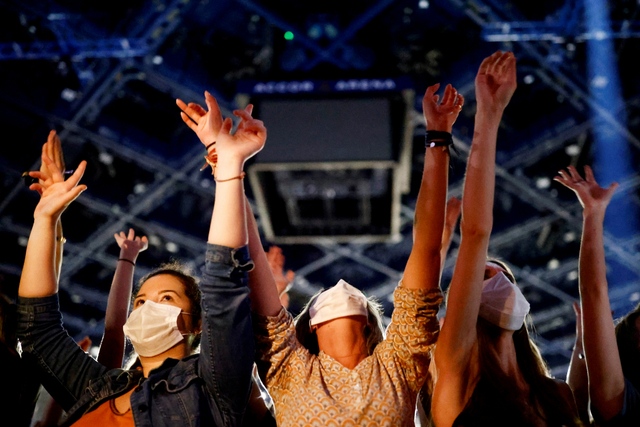 Eksperimen konser dengan protokol kesehatan di Paris, Prancis. Foto: REUTERS/Christian Hartmann