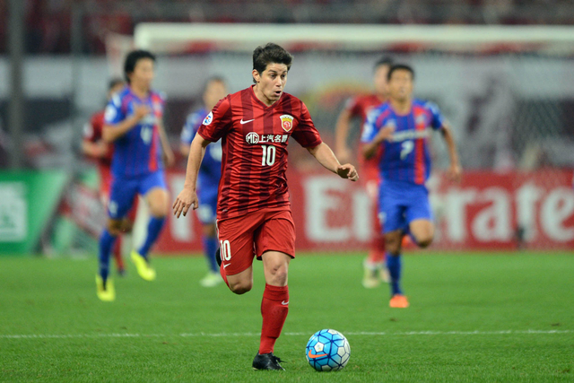 Pesepak bola asal Argentina, Dario Leonardo Conca saat membela China's Shanghai SIPG (24/5/2016). Foto: AFP/STR